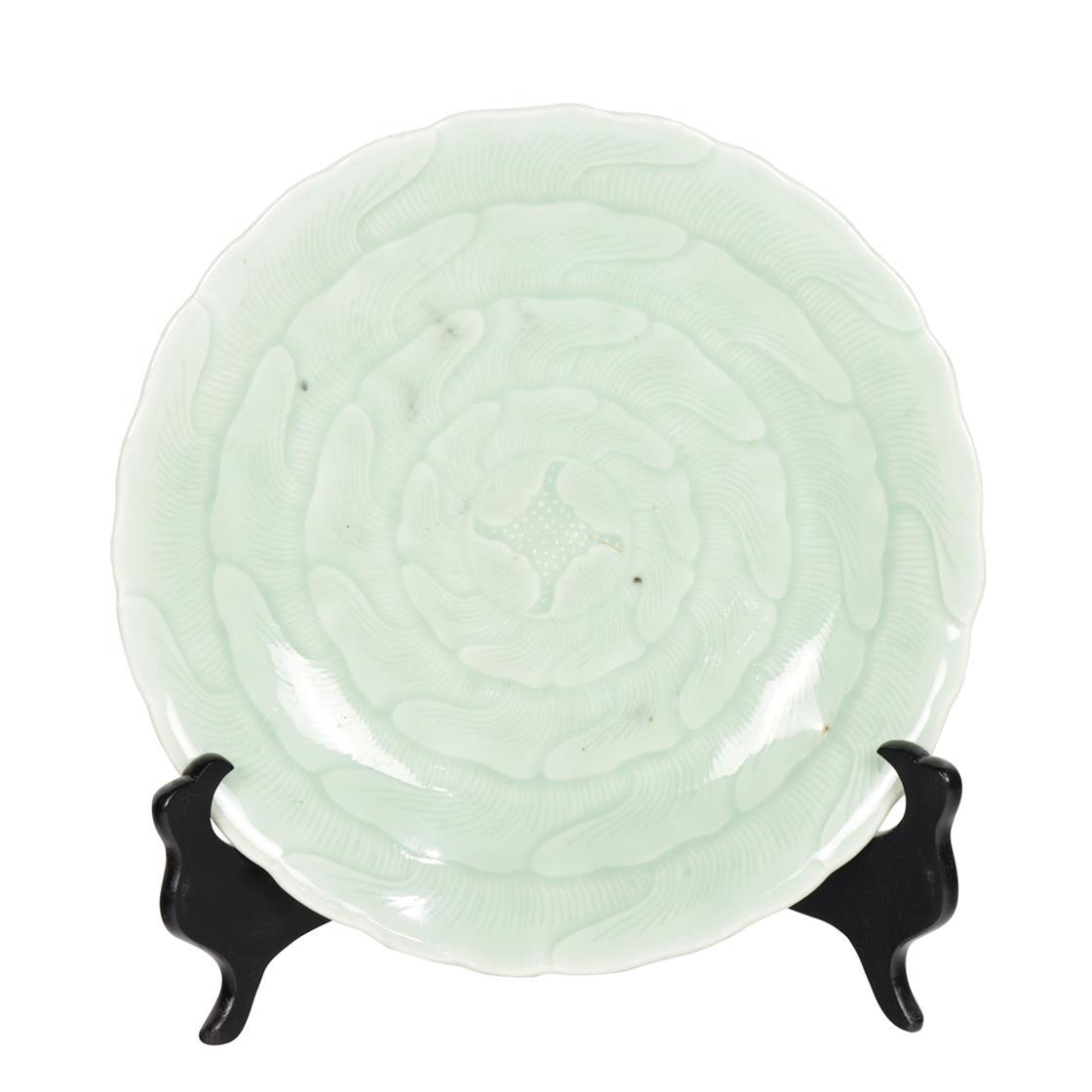 A CHINESE CELADON-GLAZED 'LOTUS' DISH